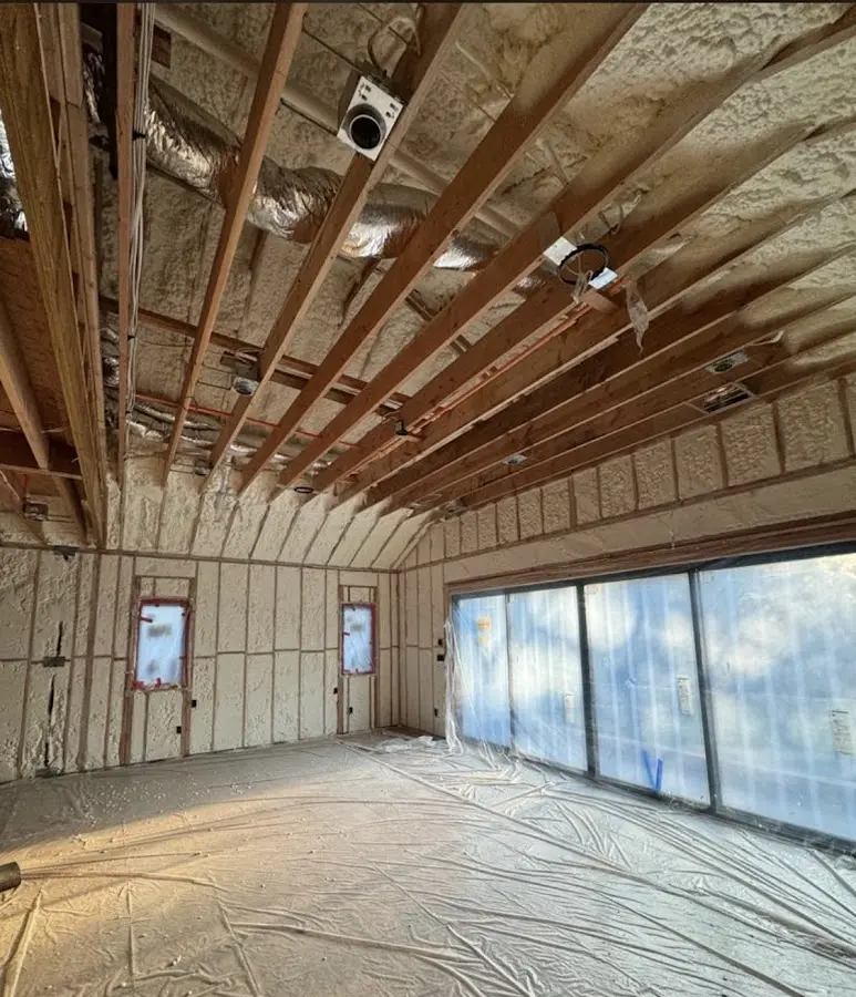 Interior walls and ceiling insulated with spray foam during new construction in Kailua